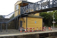 The typical DWWR 1884 built signal cabin at Wicklow Station, which is attached to the station footbridge. The cabin has since been made redundant following the replacement of mechanical signalling on the Rosslare line in 2008.