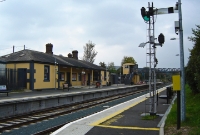 The 1885 built Wicklow (Mainline) station, looking south towards Rosslare from the up platform in the days of semaphore signalling.