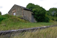 The small stone built goods shed located on the platform at the north end of Wilkinstown Station. Regular goods services on the Kingscourt branch ceased in 1963.