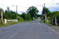 The level crossing at the south end of Wilkinstown Station on the R162 road which runs roughly paraellel to the railway from Navan to Kingscourt.