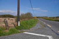 The site of Woodlands Halt on the Schull &#38; Skibbereen Tramway, looking east towards Skibbereen. Today no trace of the single platform remains, apart from a former railway sleeper on the left.