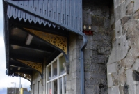 Closer view of the detailed canopy awning attached to Woodlawn Station.
